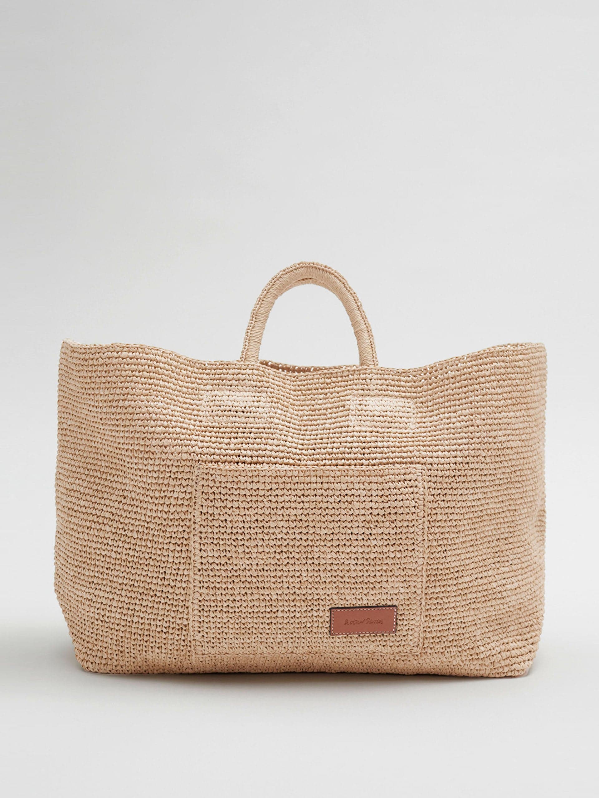 Large woven straw tote bag